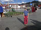 Tibet Lhasa 02 03 Peter Ryan in Barkhor Square with Jokhang behind